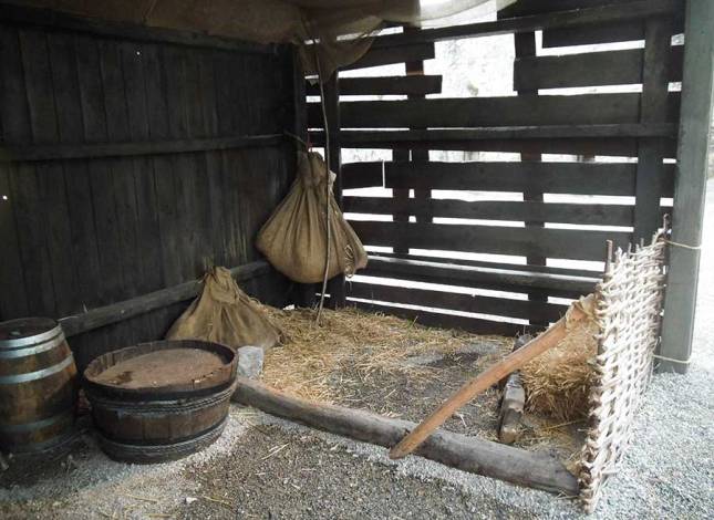 Straw bed at the end of the shelter